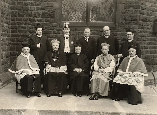 Group photograph of Catholic clergy and dignitaries outside the walls of St Walburge's.