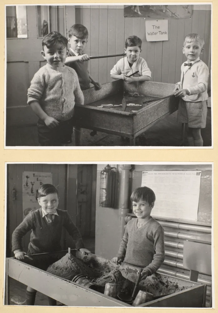 Two photographs of boys playing at a water tank labelled "The Water Tank" and a sand tray, with a BBC Schools broadcast schedule on the wall.