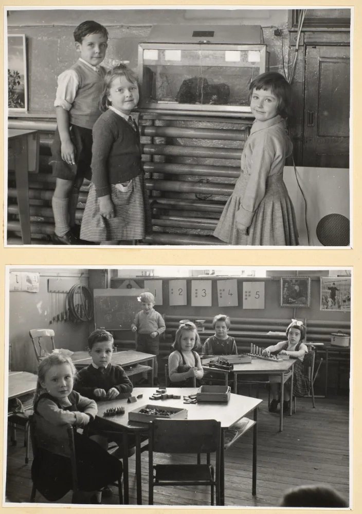 Infant pupils stand beside a glass fish tank in the upper photograph; below, others sit at tables with counting blocks near number cards 1–5.