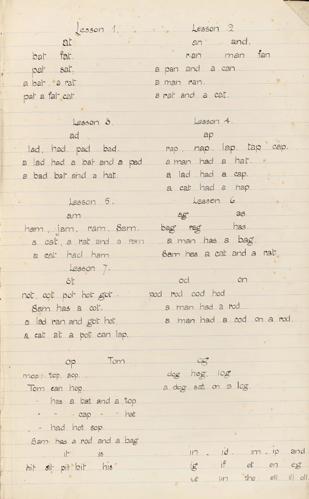 Handwritten reading exercises numbered Lesson 1 to 7, building simple words and sentences from short vowel sounds.