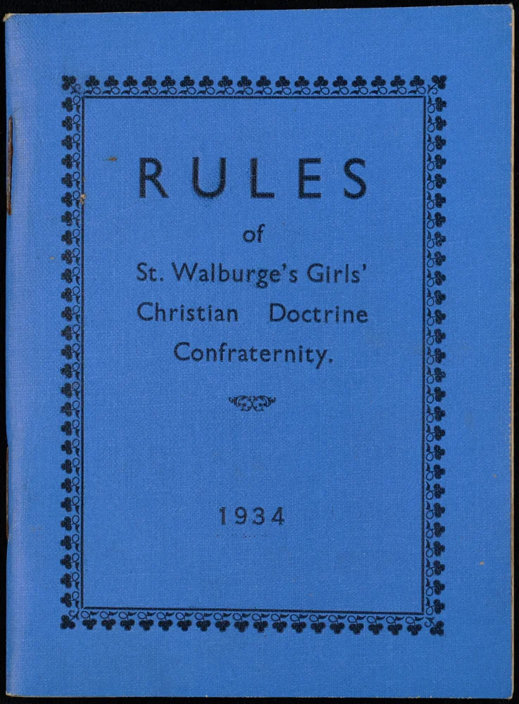 Blue booklet cover with decorative border, titled "Rules of St. Walburge's Girls' Christian Doctrine Confraternity," dated 1934.